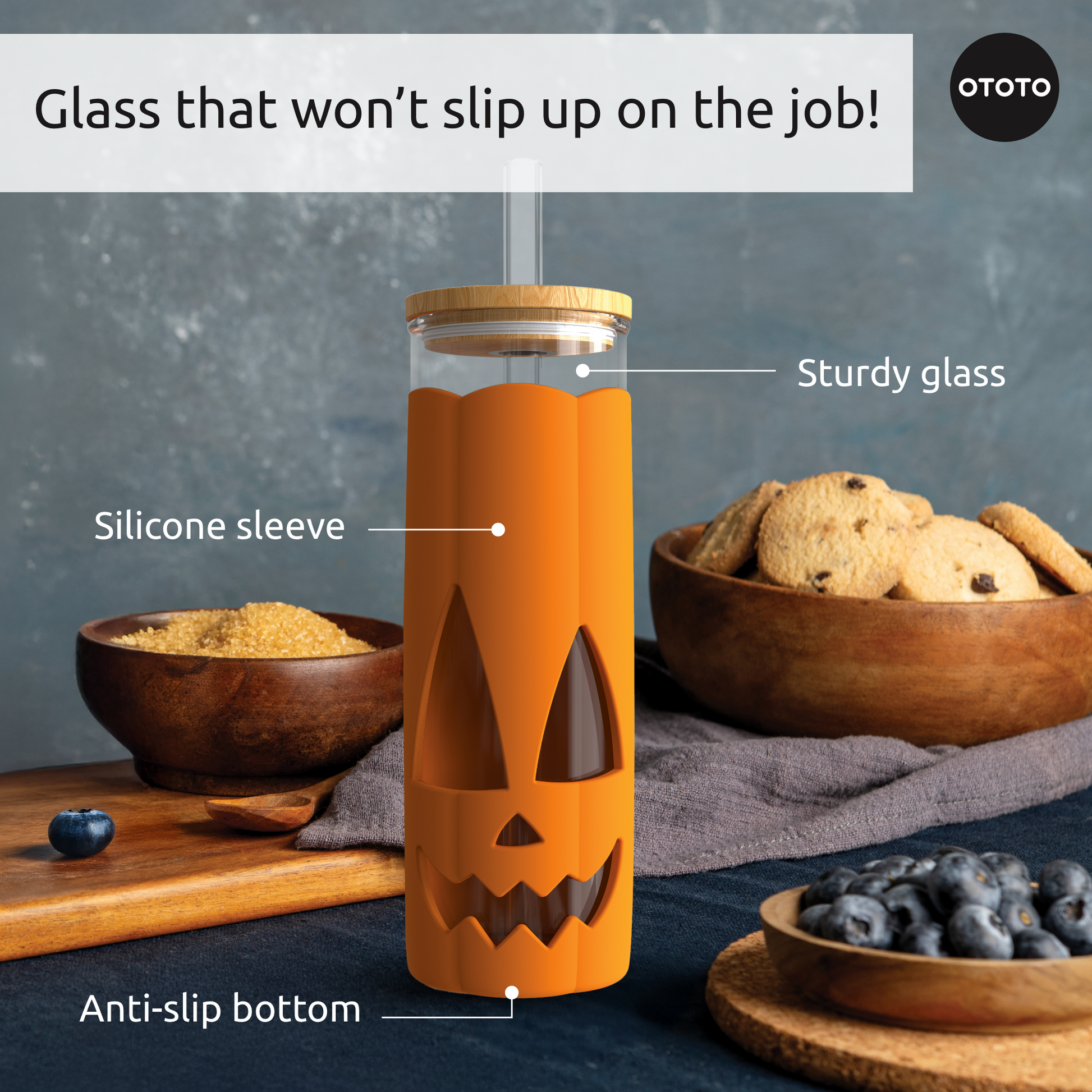 Jack-o-Cup: sturdy glass pumpkin cup with silicone sleeve and straw, perfect for pumpkin spice.