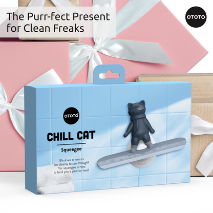 A Chill Cat gift box sits in front of wrapped presents with bows and ribbons.