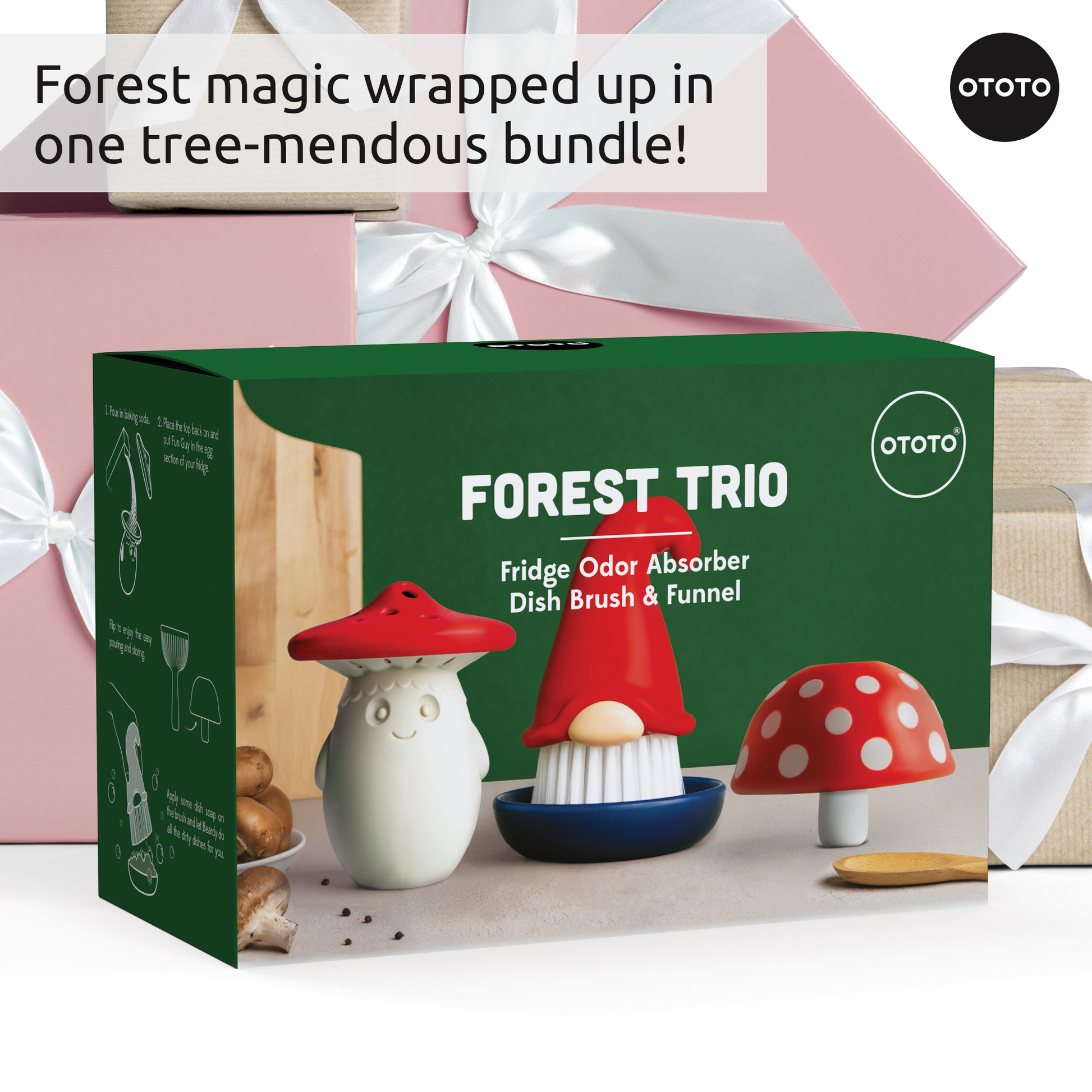 A green box of Forest Trio mushroom-shaped dish brushes, surrounded by gifts and white ribbons.