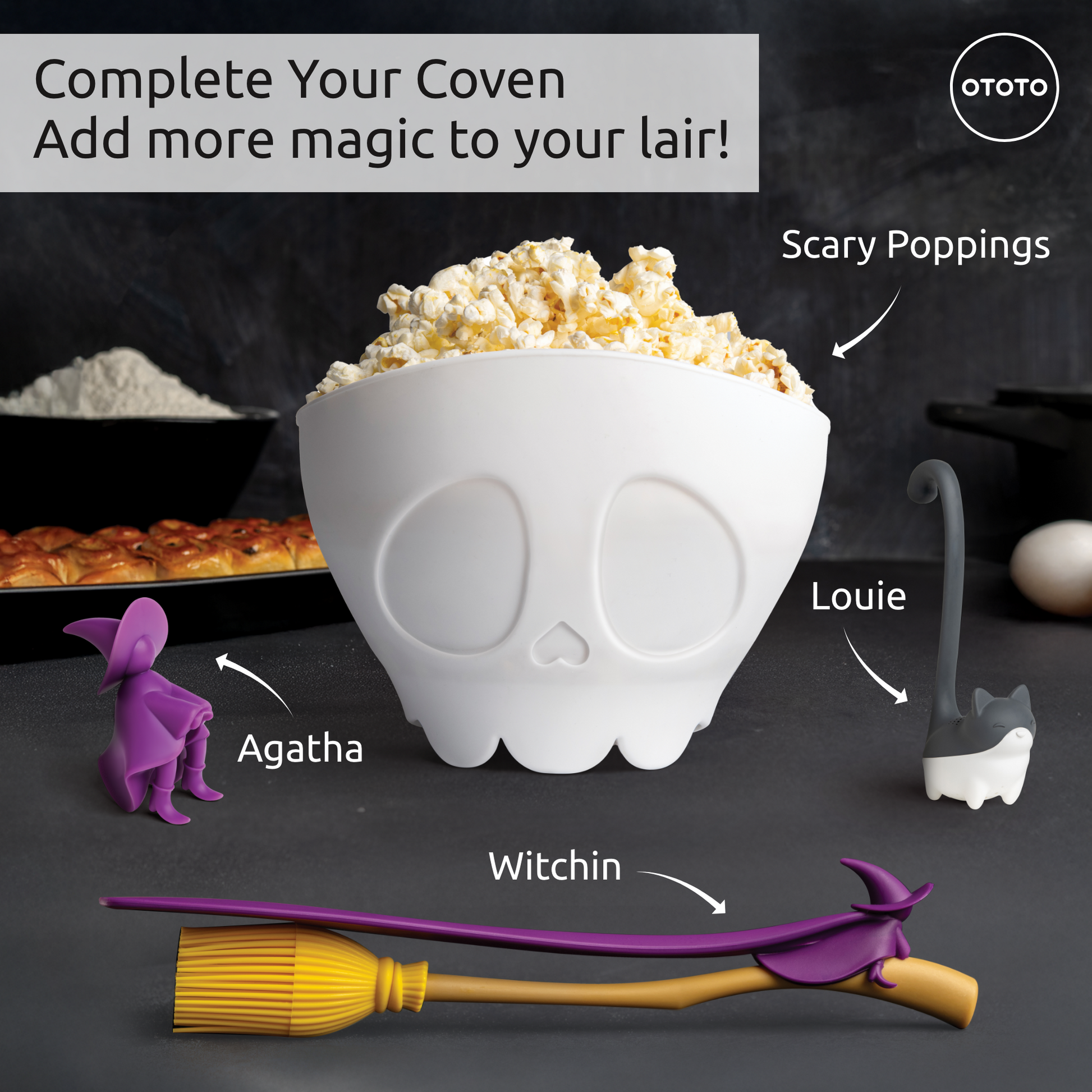 Witchin skull bowl with popcorn, heat-resistant silicone spatula, and witch-themed kitchen tools.