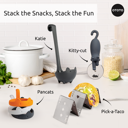 Four playful tools: cat ladle, cat pizza cutter, animal egg ring, and Pick-a-Taco taco holders.