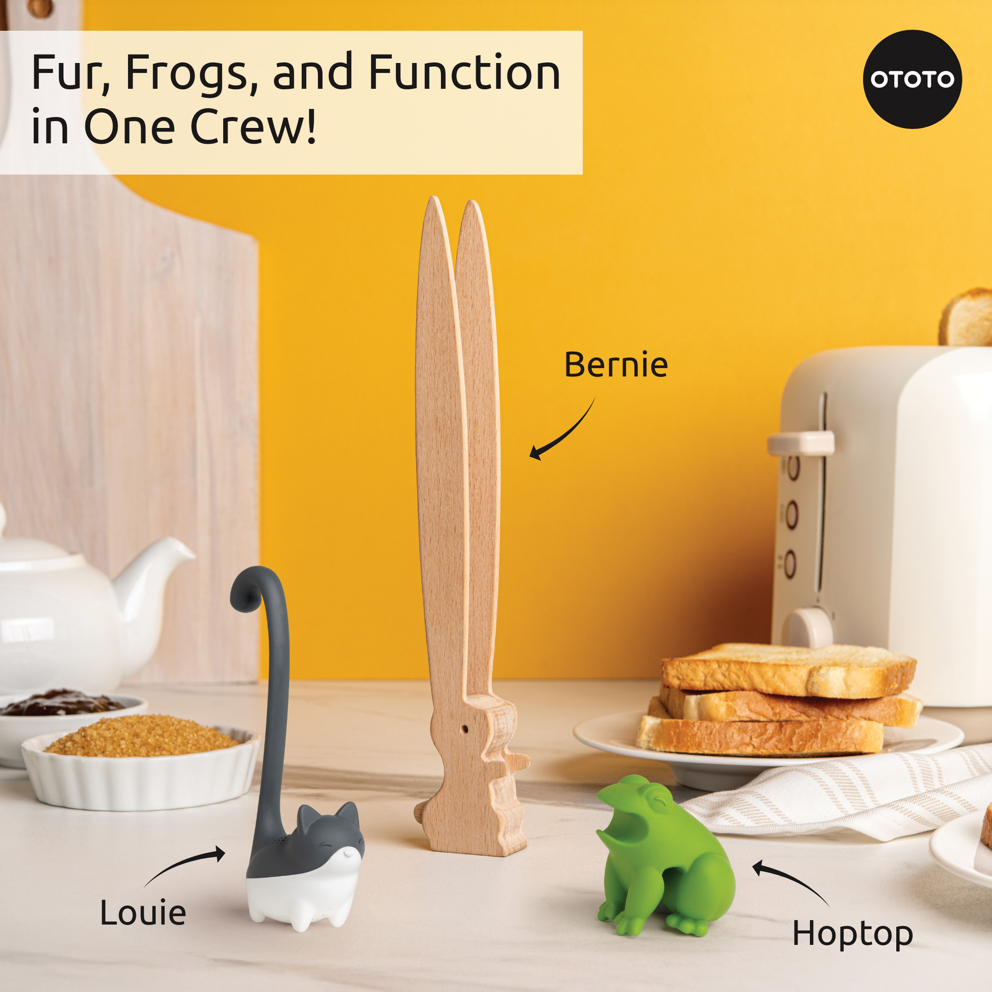 Three quirky Prep Pals kitchen tools—a cat, rabbit, and frog—sit on a breakfast counter.