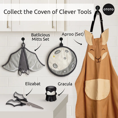Batlicious kitchen tools set: bat, full moon, vampire tools & kangaroo apron on hooks.