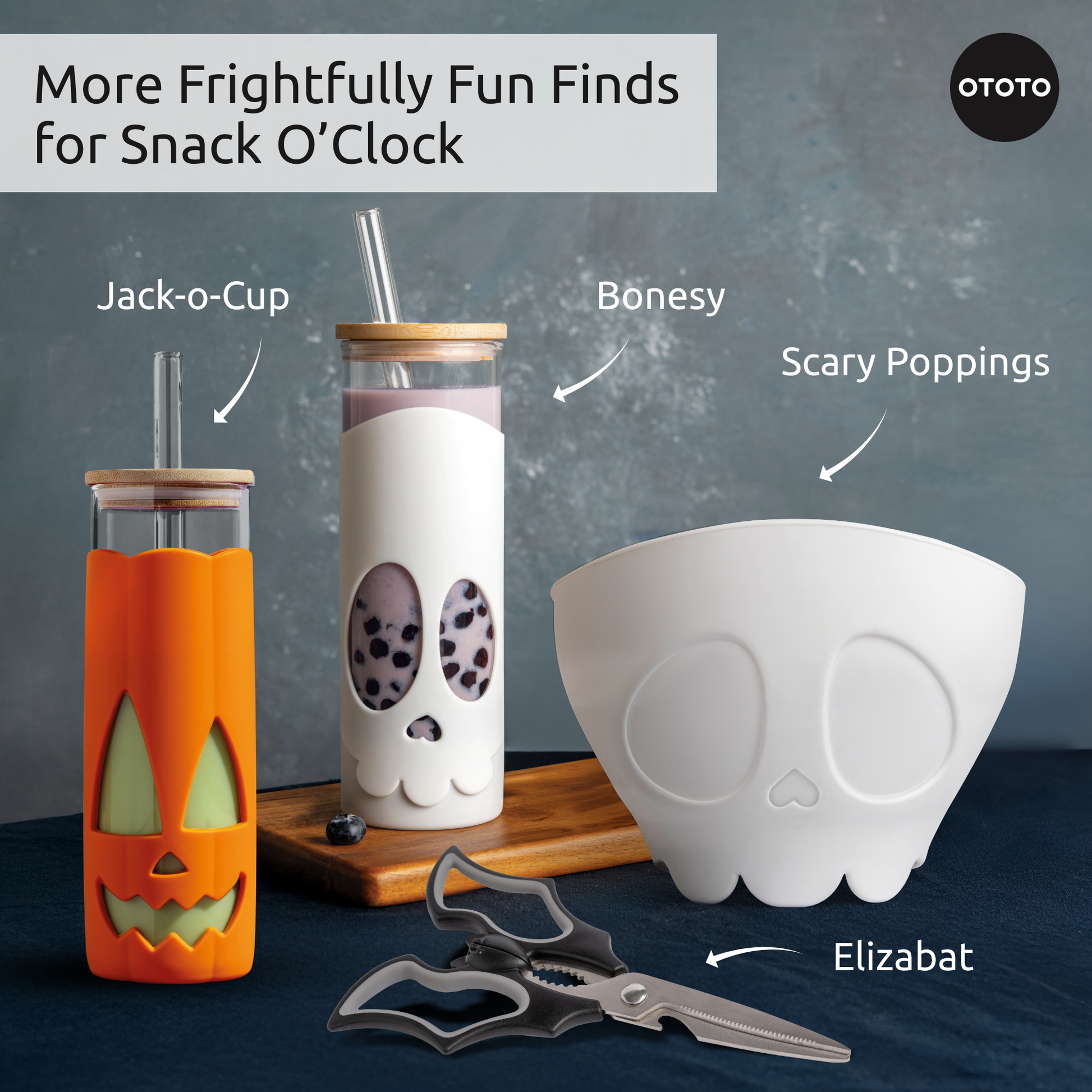 Halloween snacks: Jack-o-Cup, two spooky cups, skull bowl, and bat-shaped scissors.