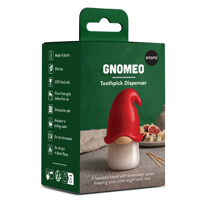 Gnomeo toothpick dispenser by OTOTO, shaped like a gnome with red hat on green background.