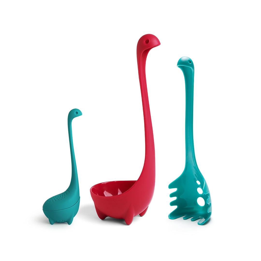 Jumbo Nessie, Papa Nessie, and Baby Nessie utensils in teal and red stand upright on white.