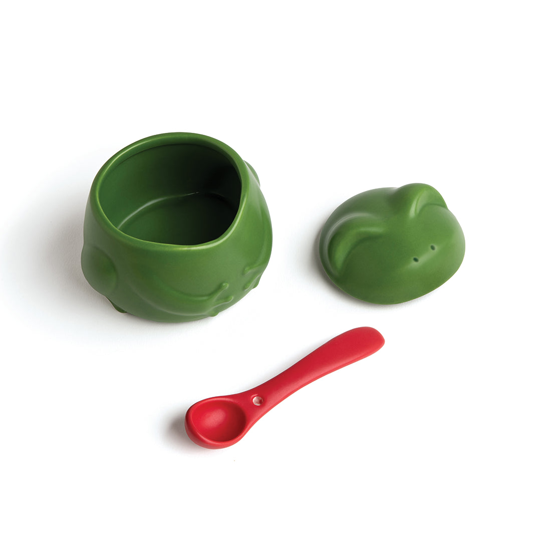 Lily set: Green frog silicone bowl with lid & red baby spoon on white background.