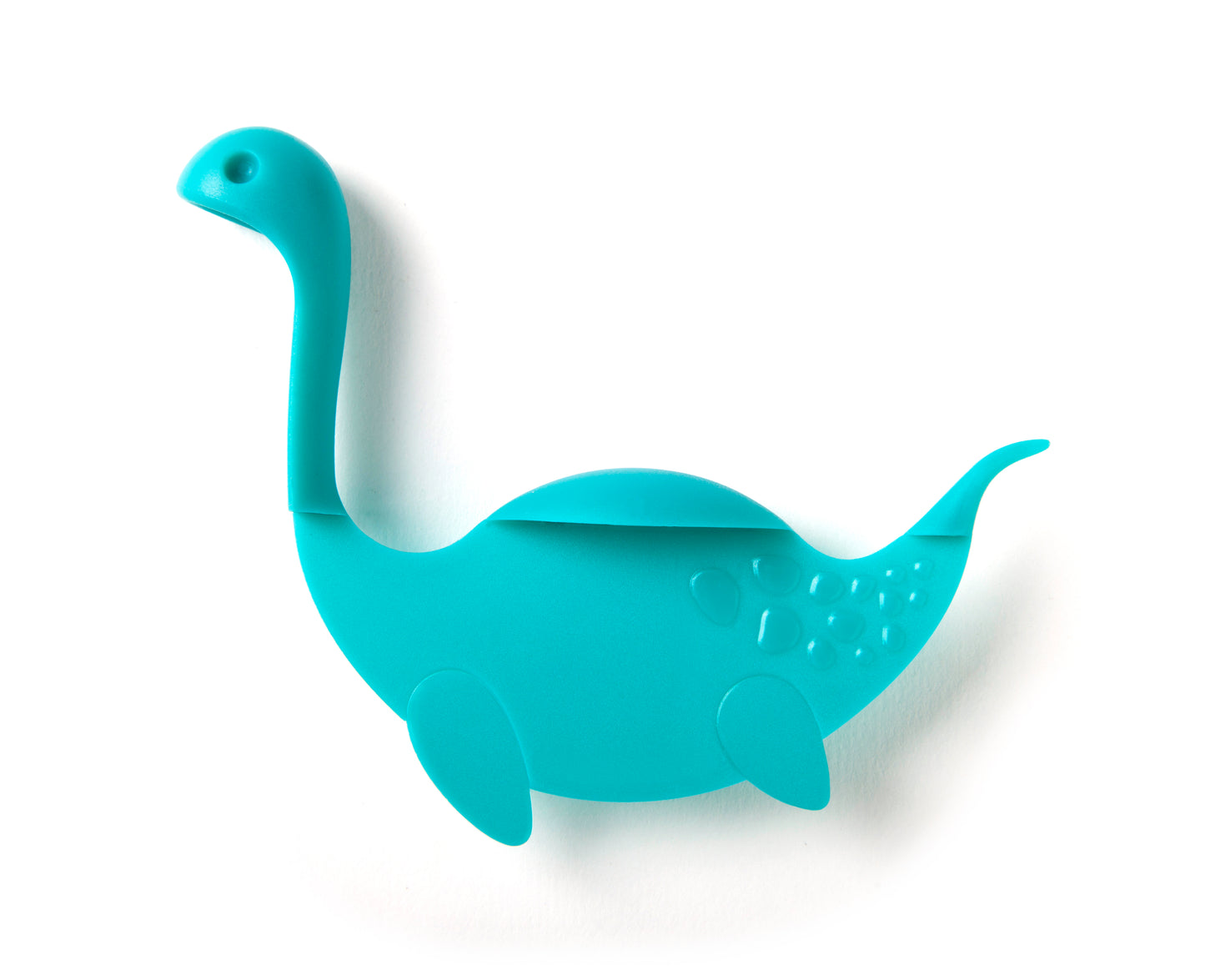 Nessie Tale blue silicone dinosaur kitchen utensil with long neck, two fins, and tail on white background.