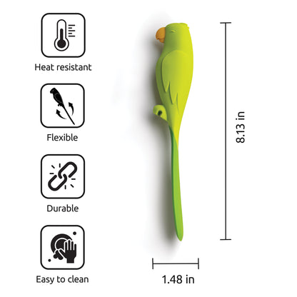 Parry, the green parrot-shaped OTOTO silicone spatula, is heat-resistant, flexible, and easy to clean.