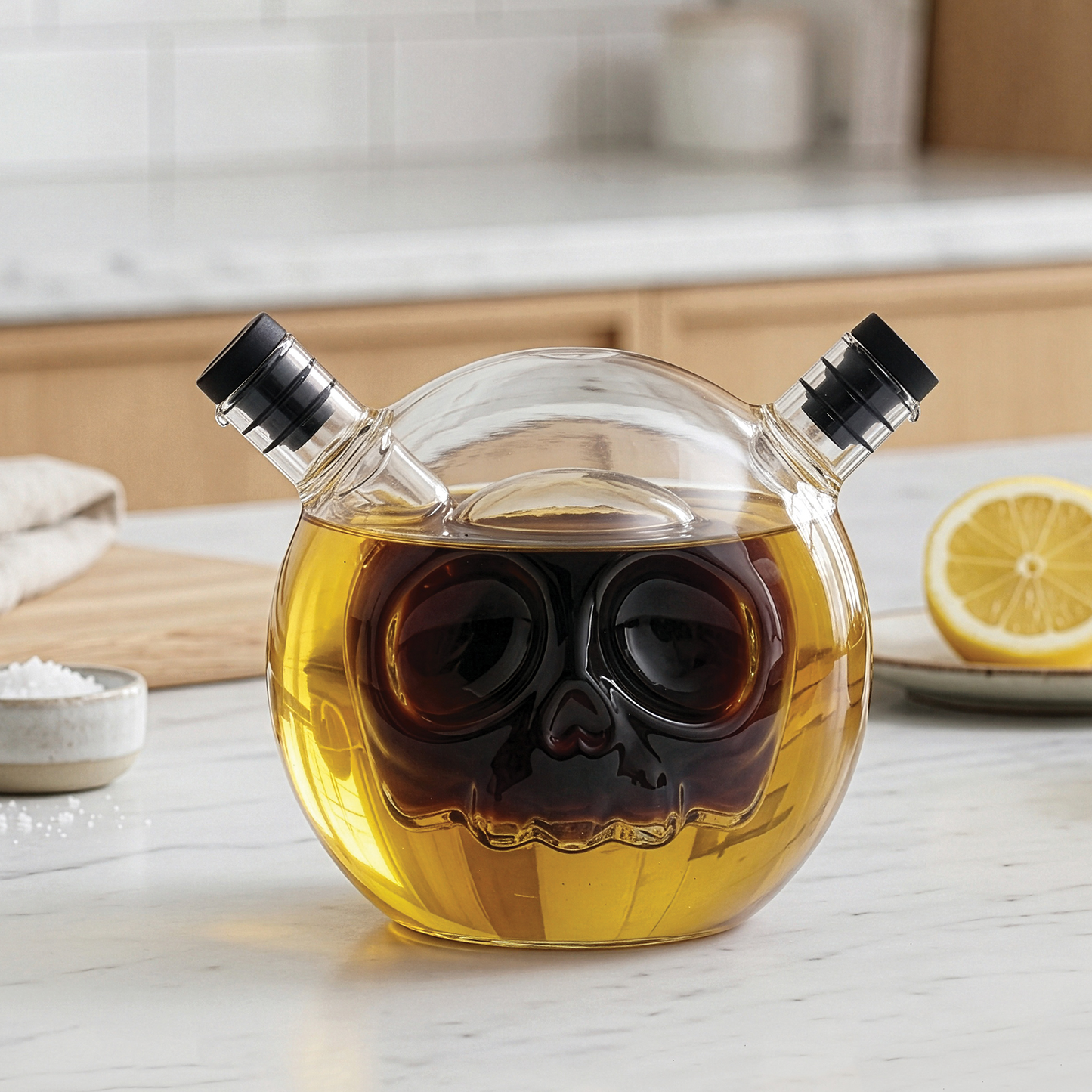 Skully-Olio: a quirky OTOTO dispenser with a skull-shaped center for oil and vinegar.