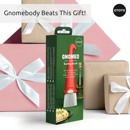 Gift-wrapped boxes with a Gnomeo pastry brush in front; text reads Gnomebody Beats This Gift!.